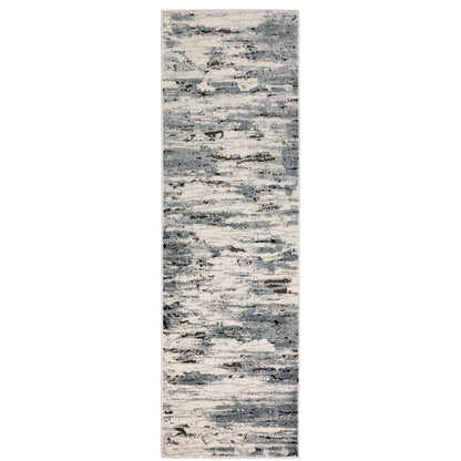 Oriental Weavers Caravan 750W8 soft area rug featuring textured design in blue/ grey tones