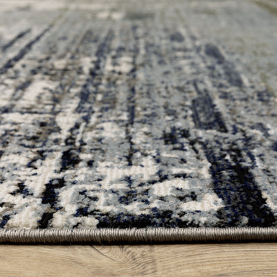 Oriental Weavers Caravan 8020L soft area rug featuring textured design in blue/ green tones
