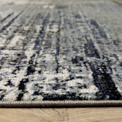 Oriental Weavers Caravan 8020L soft area rug featuring textured design in blue/ green tones