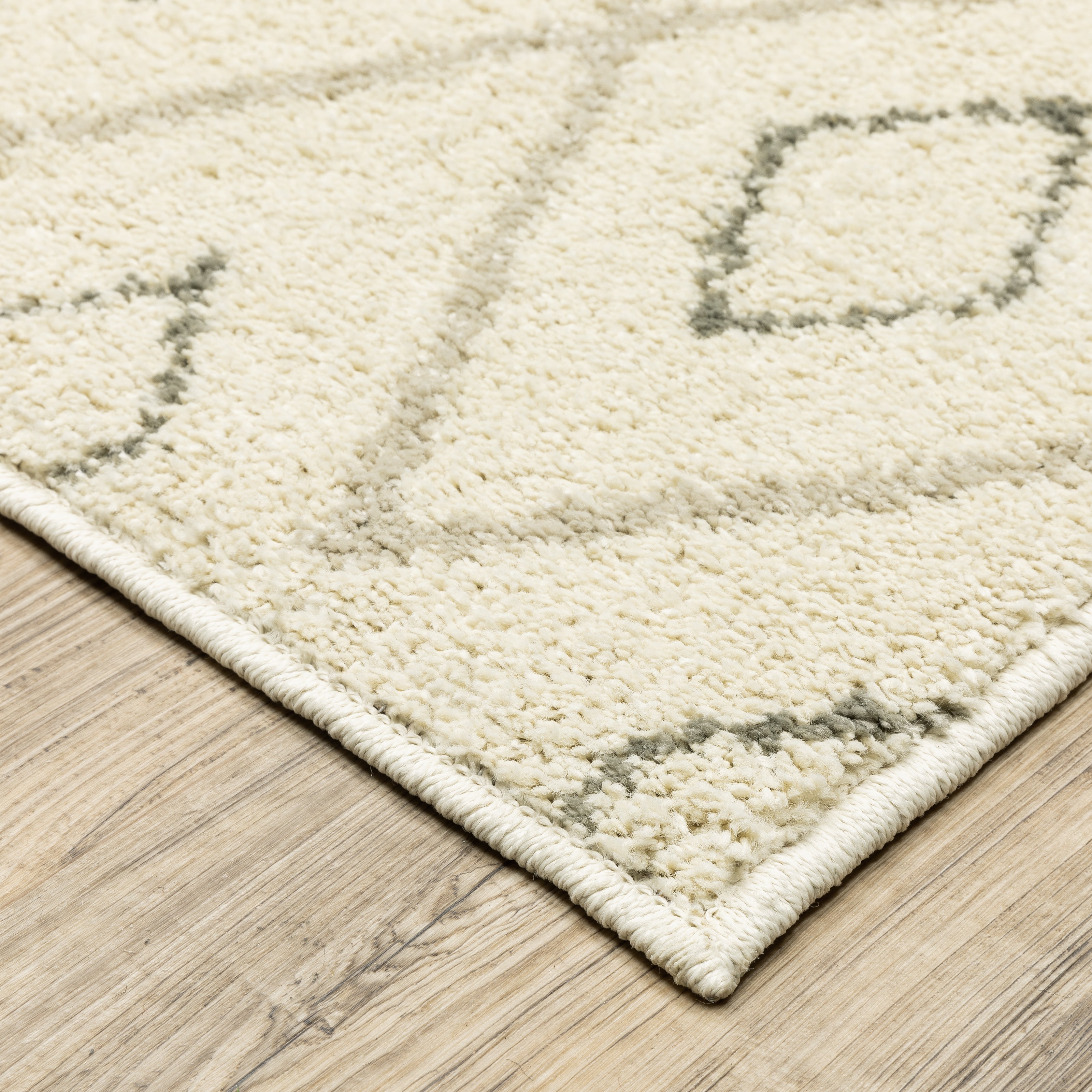 Oriental Weavers Carson 3943G plush traditional rug featuring abstract pattern in ivory/ sand tones