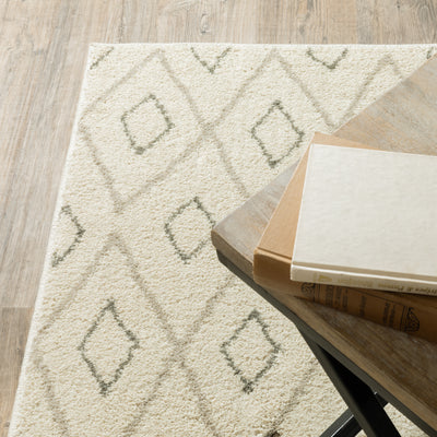Oriental Weavers Carson 3943G plush traditional rug featuring abstract pattern in ivory/ sand tones