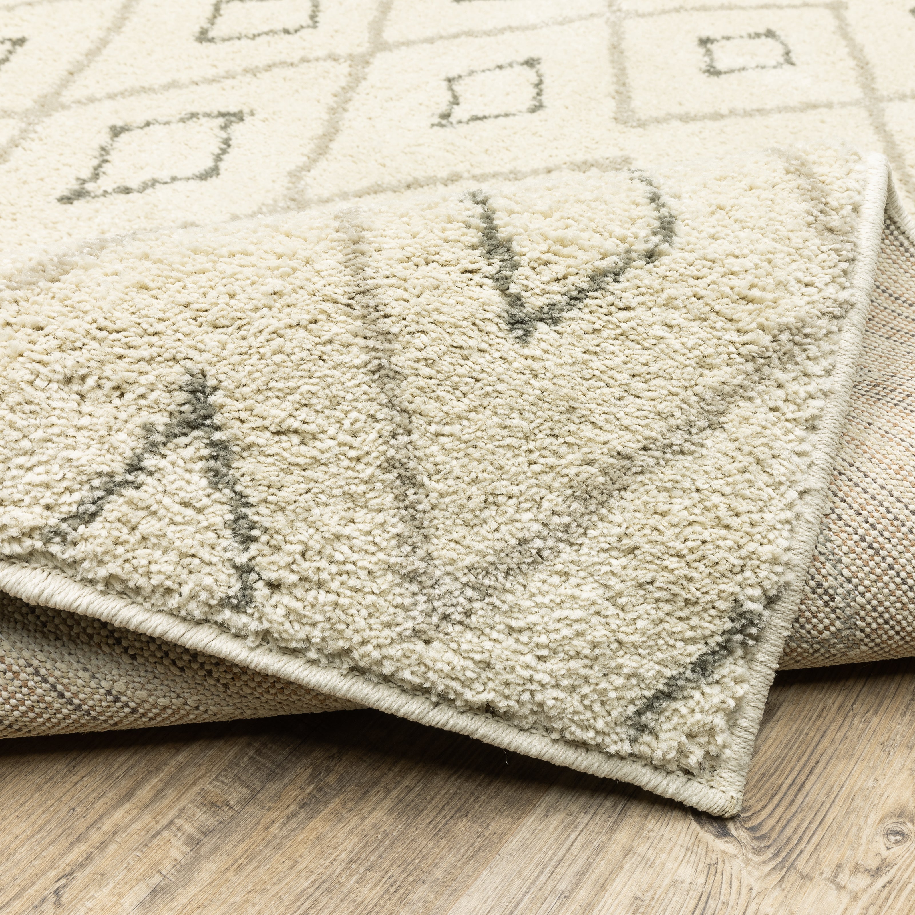 Oriental Weavers Carson 3943G plush traditional rug featuring abstract pattern in ivory/ sand tones