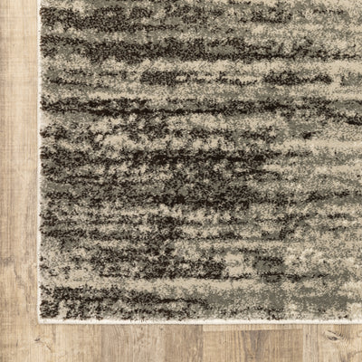Oriental Weavers Carson 0735A plush modern rug featuring abstract pattern in beige/ grey tones