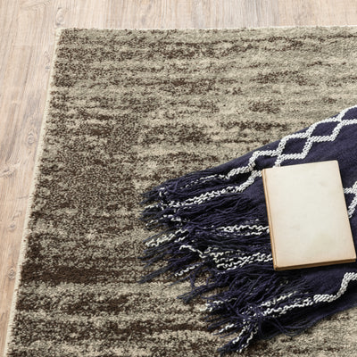Oriental Weavers Carson 0735A plush modern rug featuring abstract pattern in beige/ grey tones