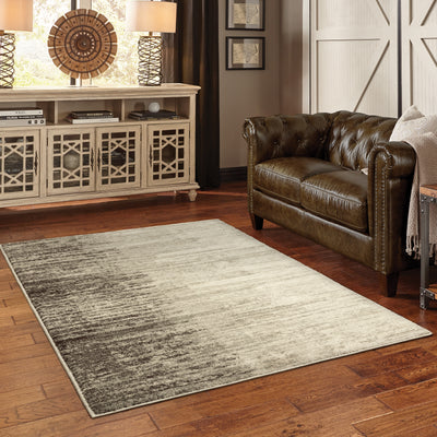 Oriental Weavers Carson 0735A plush modern rug featuring abstract pattern in beige/ grey tones