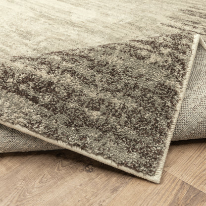 Oriental Weavers Carson 0735A plush modern rug featuring abstract pattern in beige/ grey tones