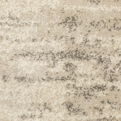 Oriental Weavers Carson 0735A plush modern rug featuring abstract pattern in beige/ grey tones