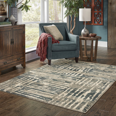 Oriental Weavers Carson 0745C plush modern rug featuring abstract pattern in blue/ beige tones