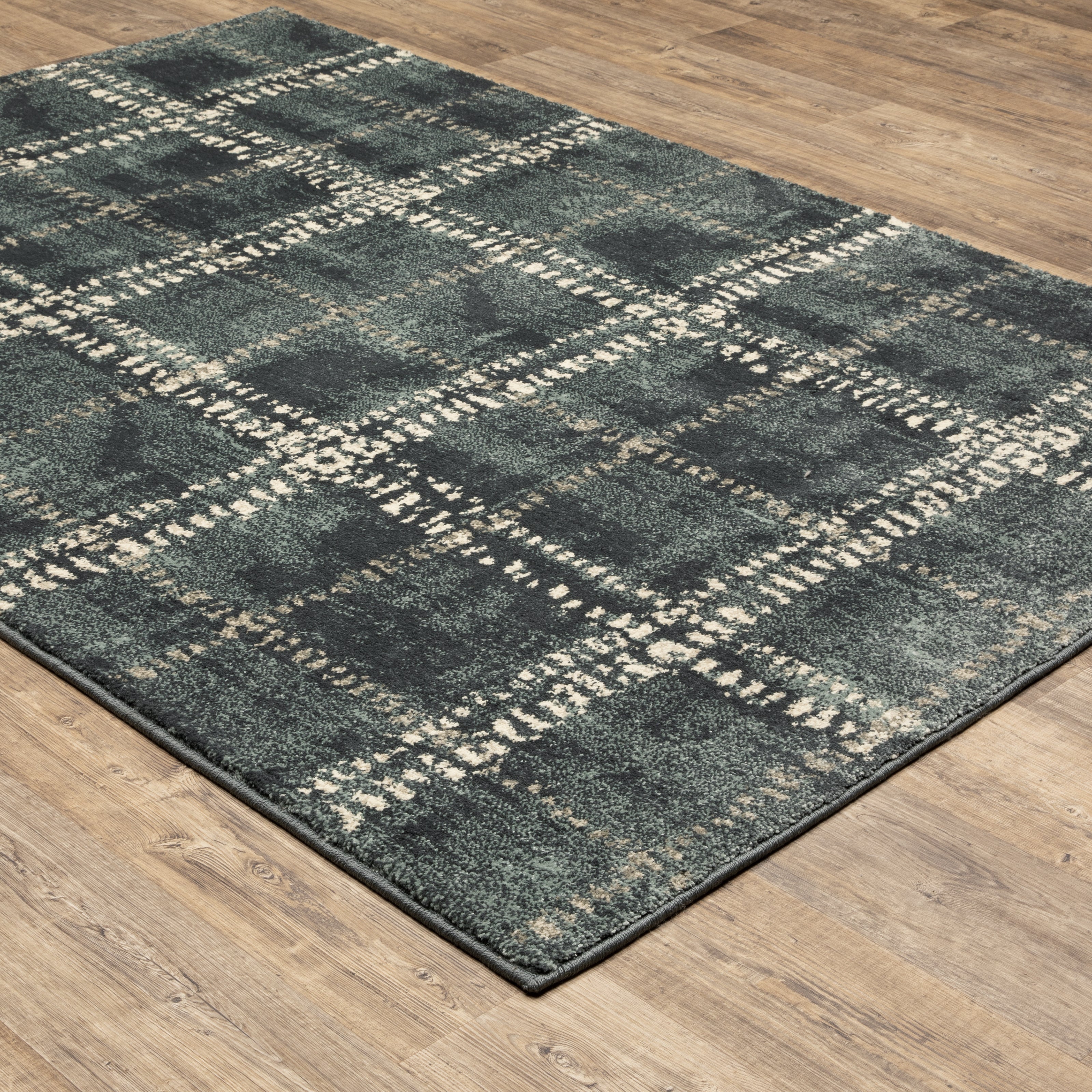 Oriental Weavers Carson 0746J plush modern rug featuring abstract pattern in blue/ ivory tones