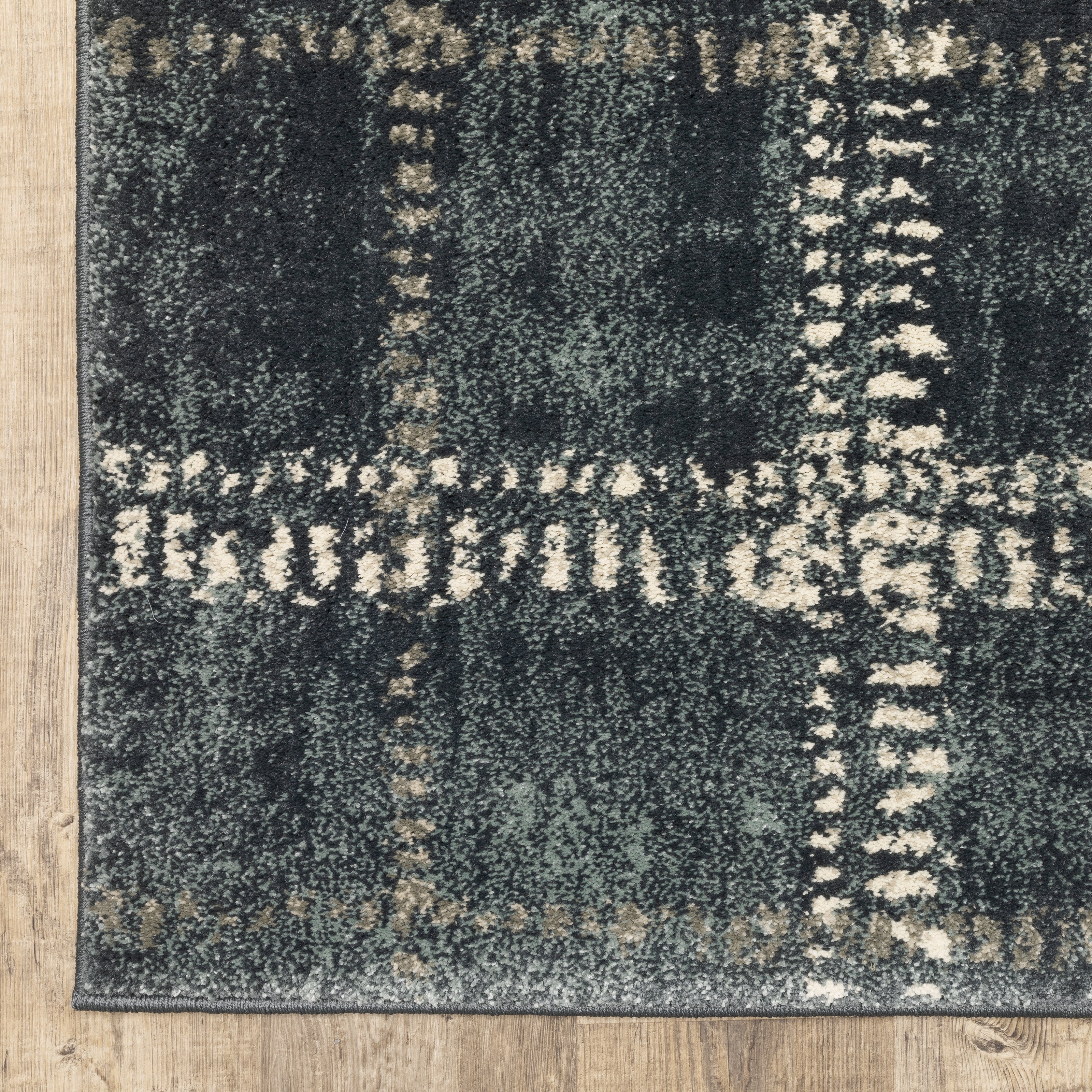 Oriental Weavers Carson 0746J plush modern rug featuring abstract pattern in blue/ ivory tones