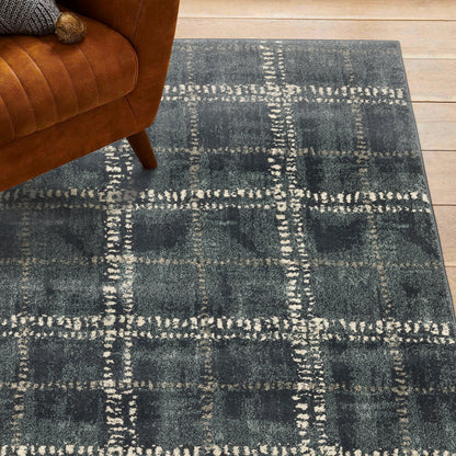 Oriental Weavers Carson 0746J plush modern rug featuring abstract pattern in blue/ ivory tones