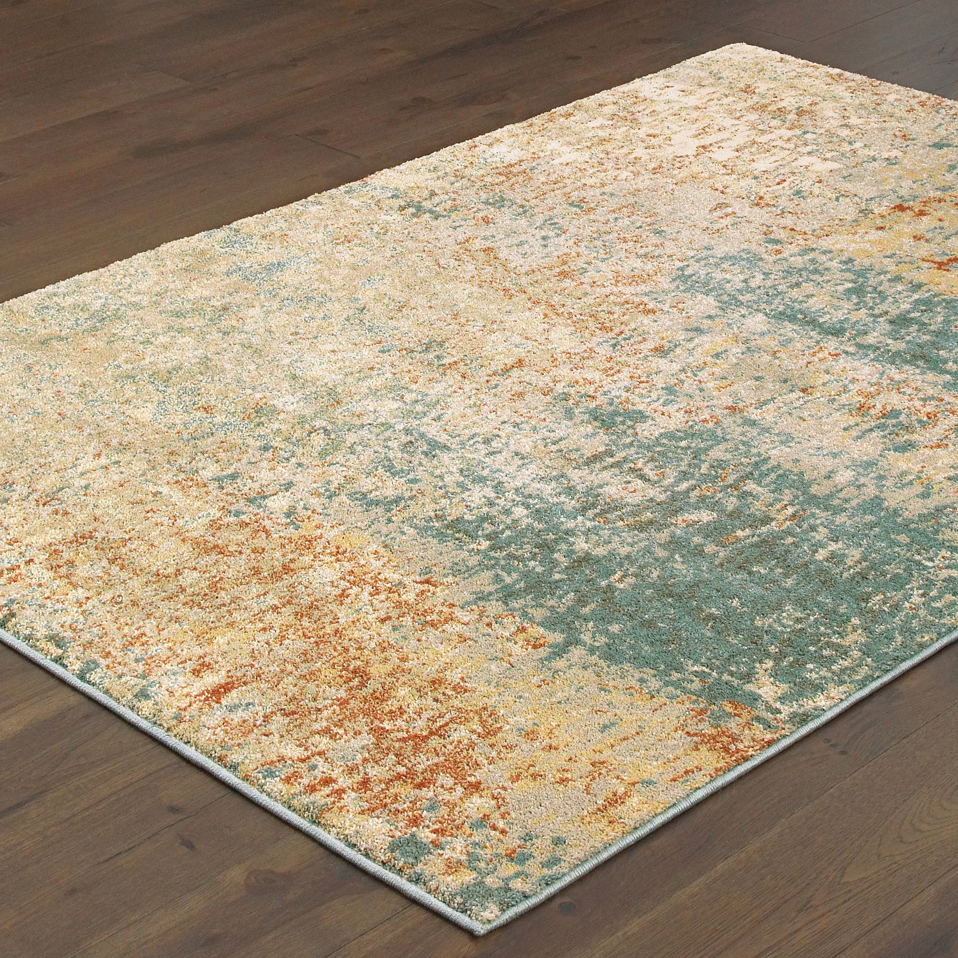Oriental Weavers Carson 9654B plush modern rug featuring abstract pattern in blue/ orange tones