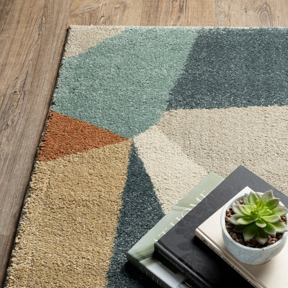 Oriental Weavers Carson 9659B plush modern rug featuring abstract pattern in blue/ orange tones