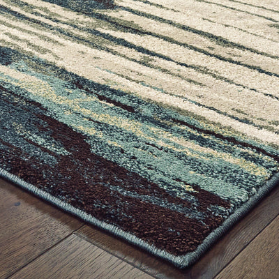 Oriental Weavers Carson 9675A plush modern rug featuring abstract pattern in blue/ brown tones