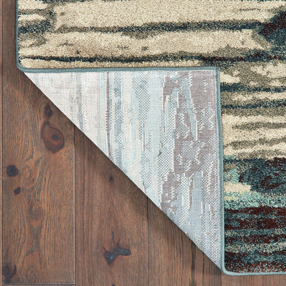 Oriental Weavers Carson 9675A plush modern rug featuring abstract pattern in blue/ brown tones