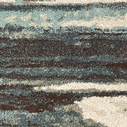 Oriental Weavers Carson 9675A plush modern rug featuring abstract pattern in blue/ brown tones