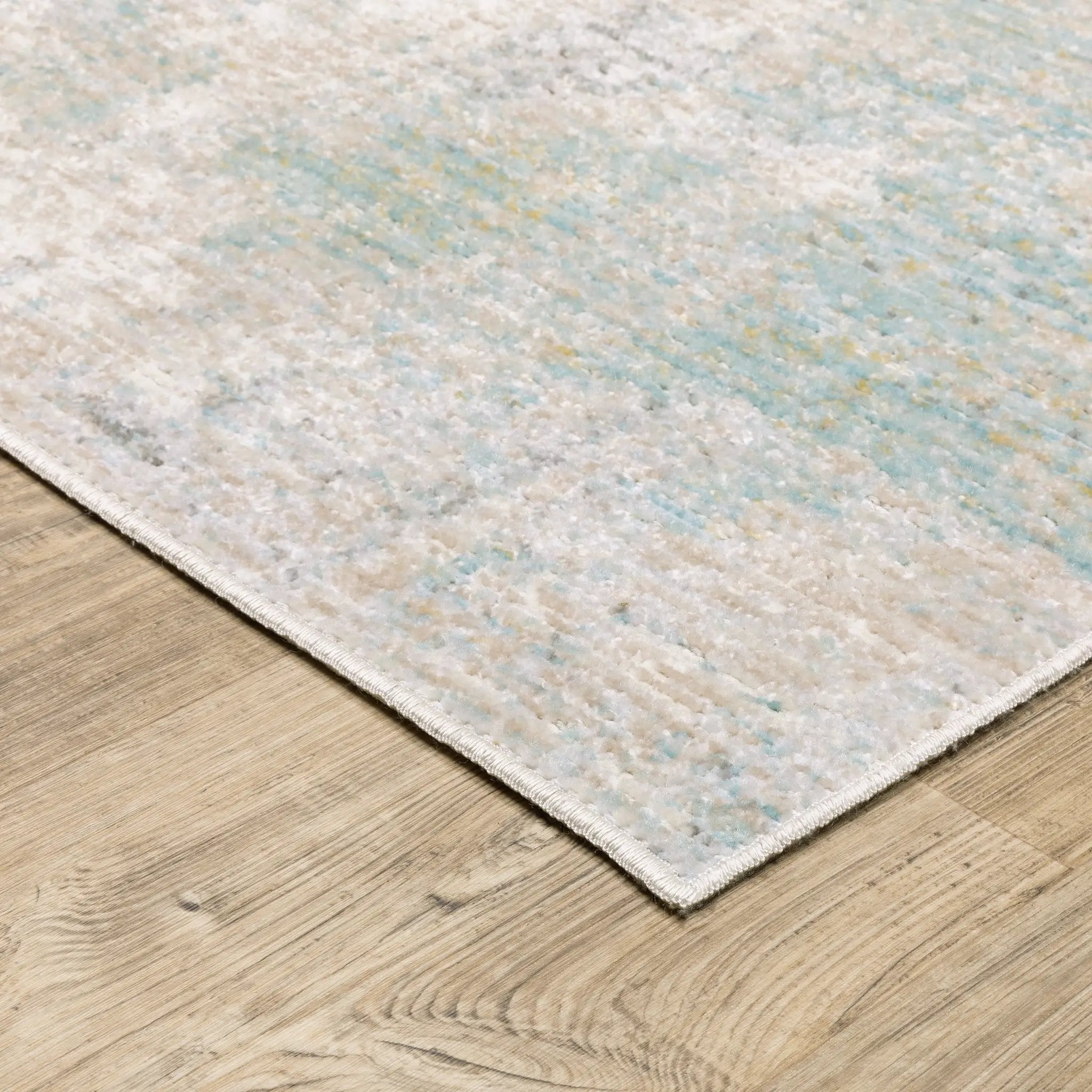 Cavett CAV01 Ivory/ Teal Area Rug by Oriental Weavers