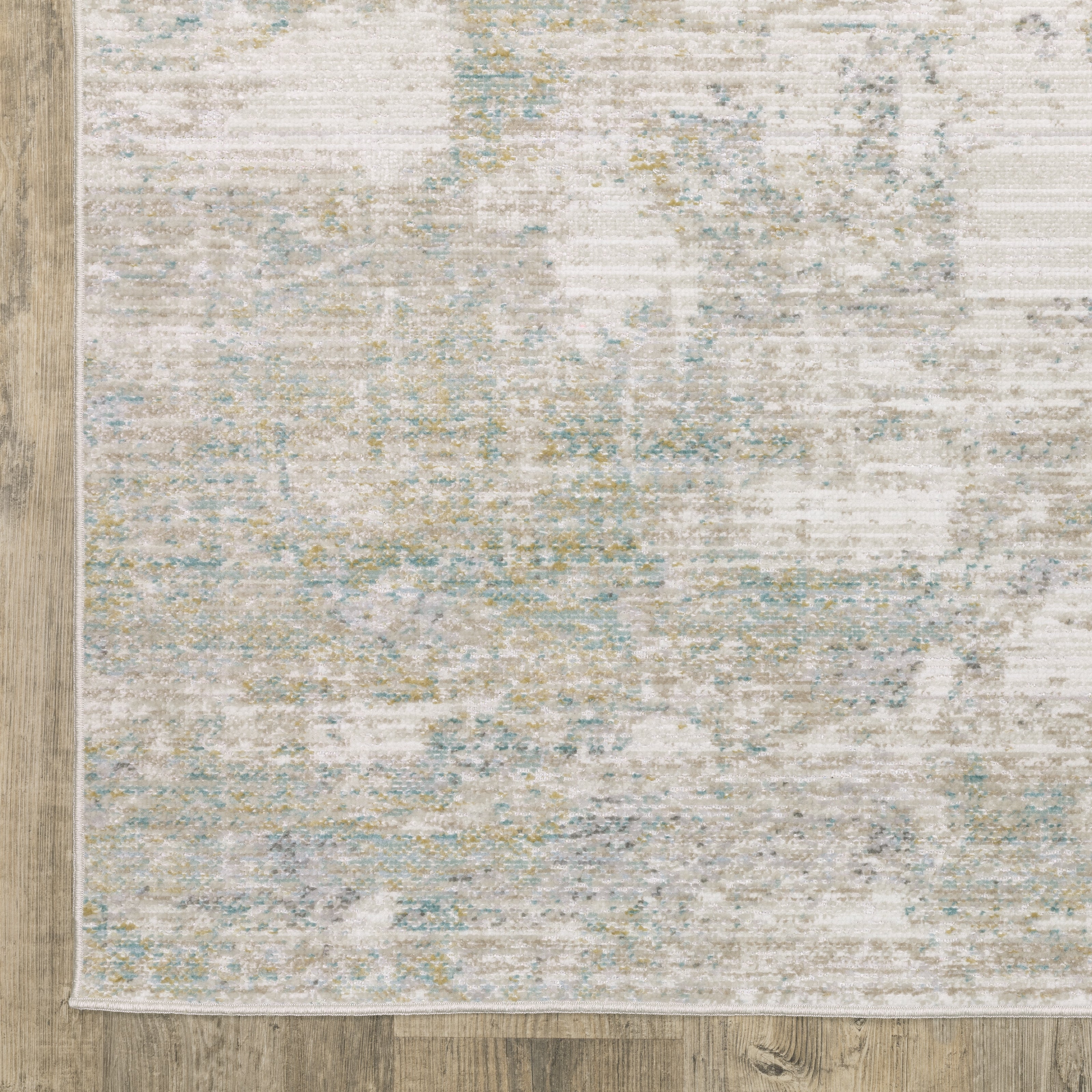 Oriental Weavers Cavett CAV01 soft transitional rug featuring decorative pattern in ivory/ teal tones