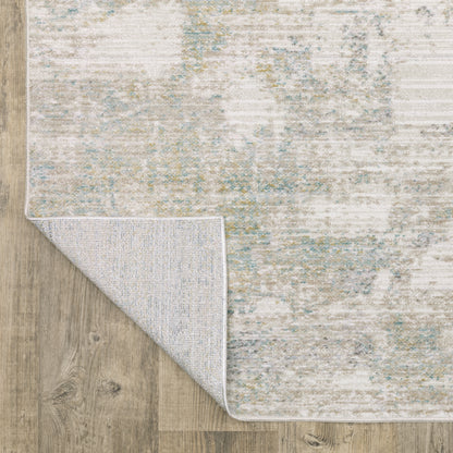Oriental Weavers Cavett CAV01 soft transitional rug featuring decorative pattern in ivory/ teal tones