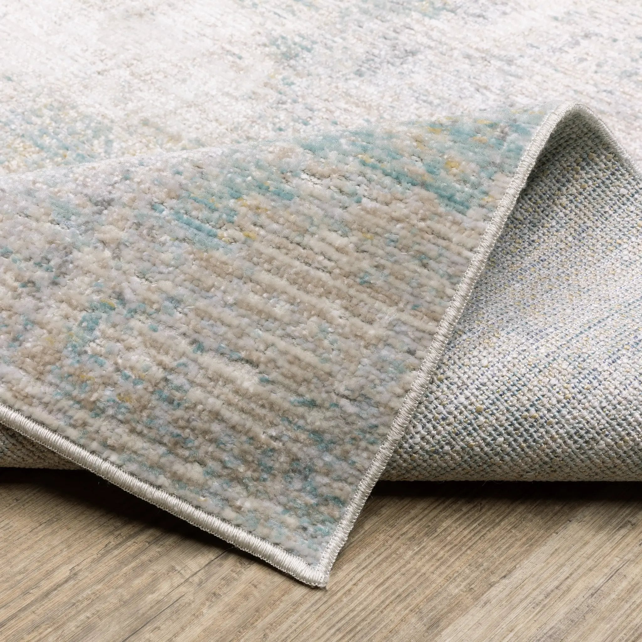 Cavett CAV01 Ivory/ Teal Area Rug by Oriental Weavers