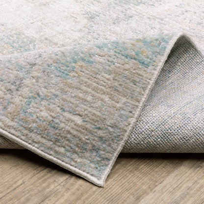 Oriental Weavers Cavett CAV01 soft transitional rug featuring decorative pattern in ivory/ teal tones