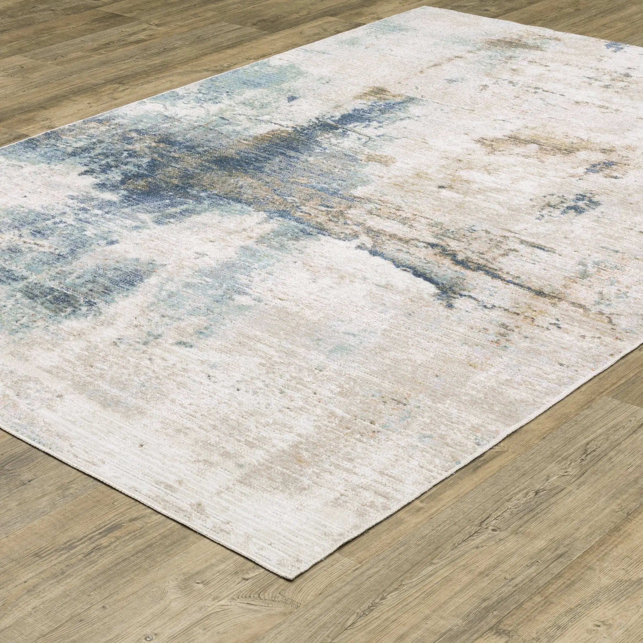 Cavett CAV03 Ivory/ Blue Area Rug by Oriental Weavers