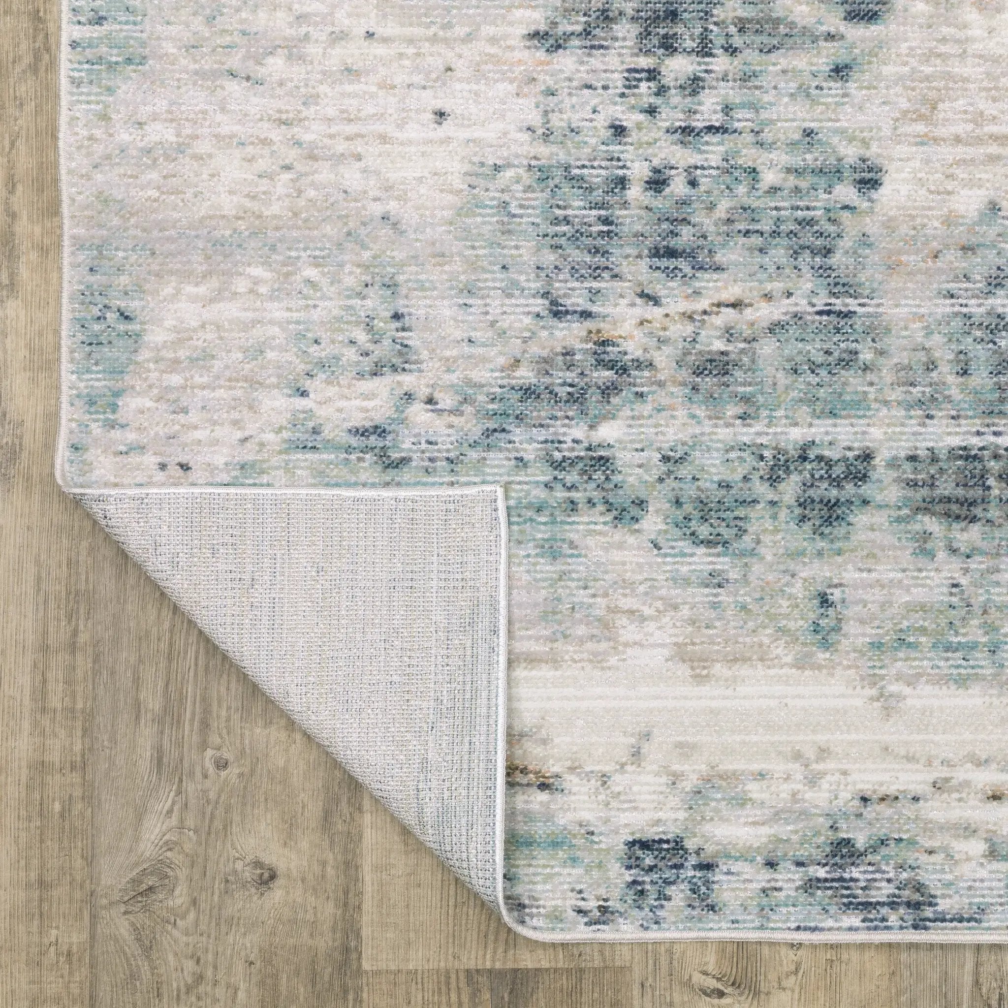 Cavett CAV03 Ivory/ Blue Area Rug by Oriental Weavers