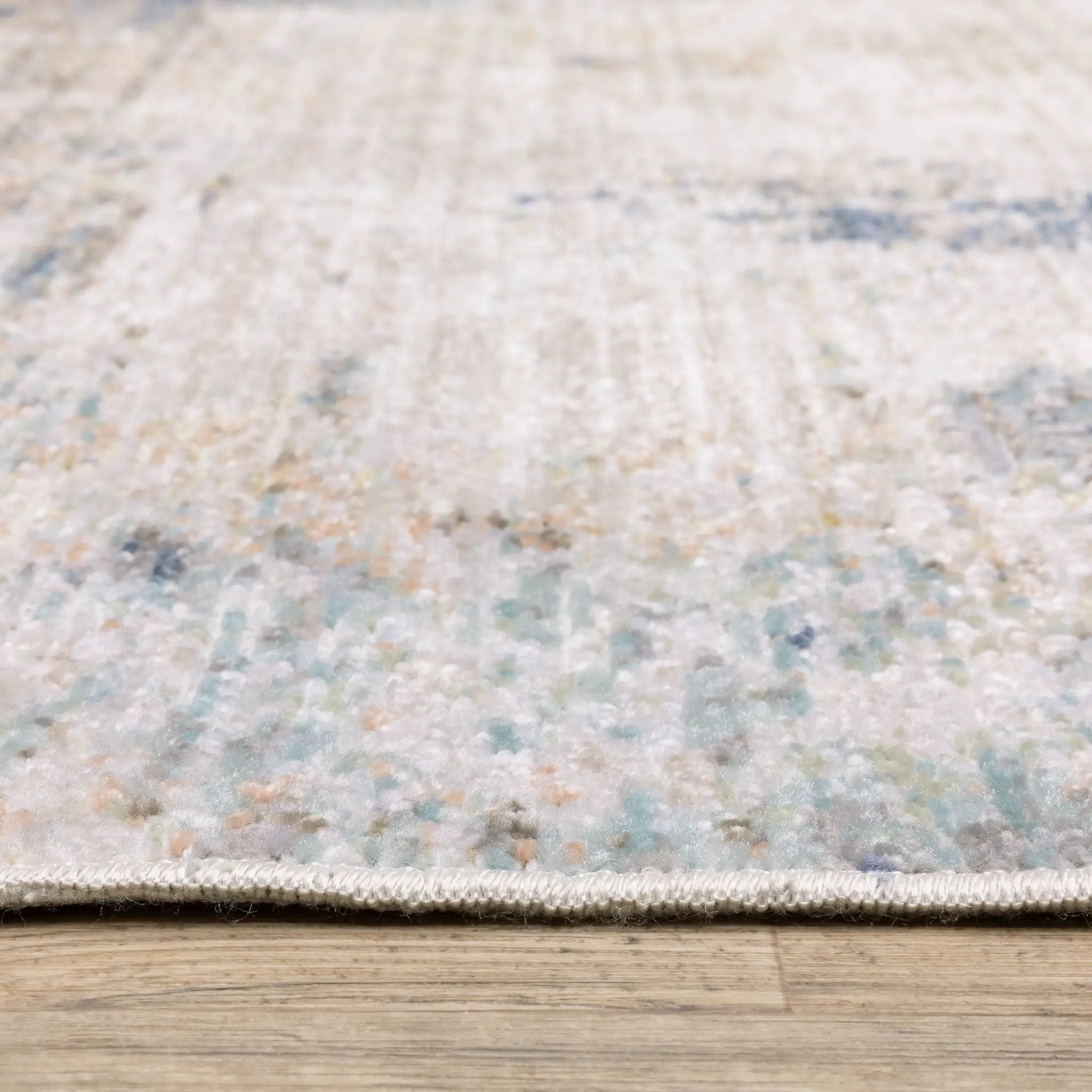 Cavett CAV03 Ivory/ Blue Area Rug by Oriental Weavers