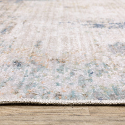 Oriental Weavers Cavett CAV03 soft transitional rug featuring decorative pattern in ivory/ blue tones