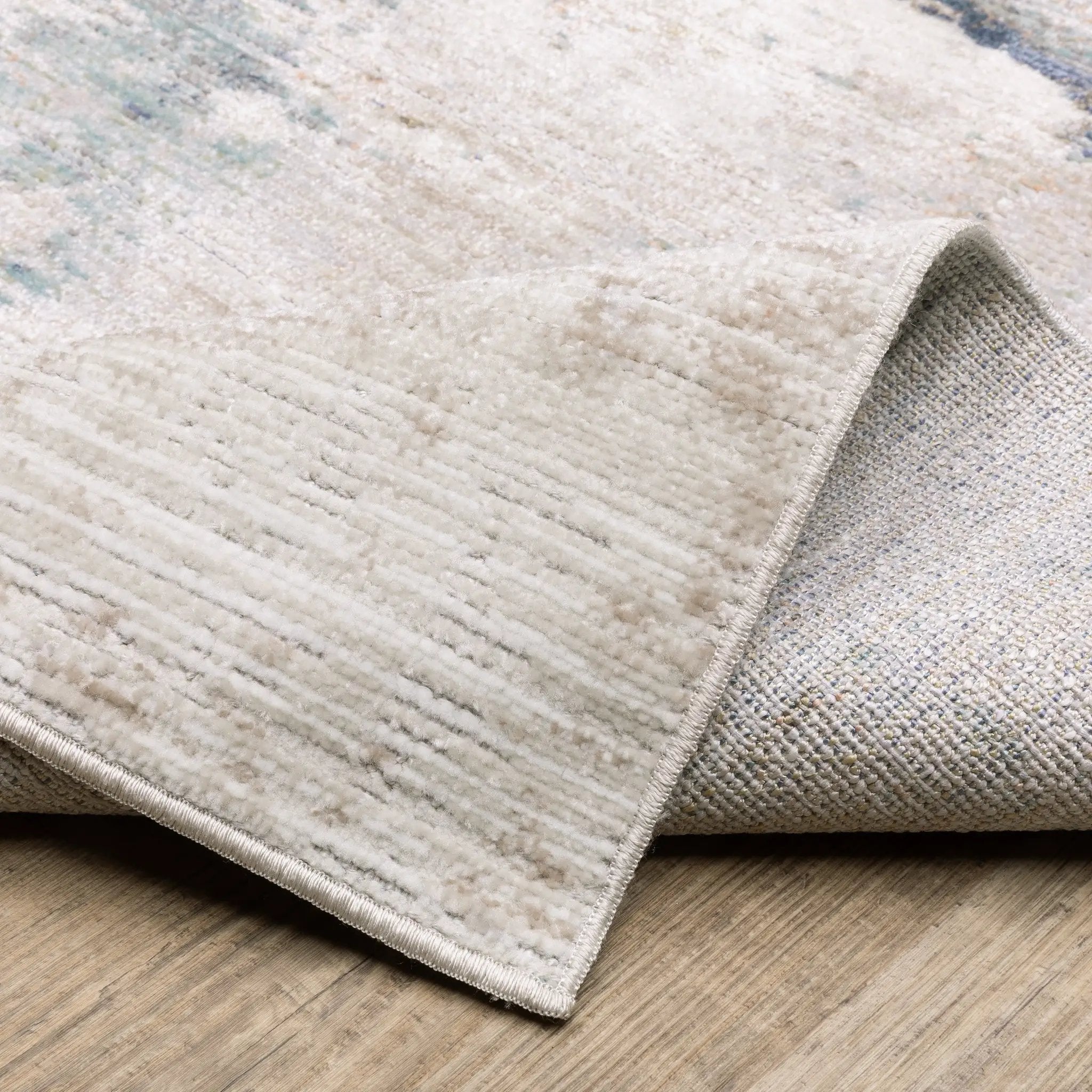 Cavett CAV03 Ivory/ Blue Area Rug by Oriental Weavers