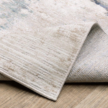 Oriental Weavers Cavett CAV03 soft transitional rug featuring decorative pattern in ivory/ blue tones