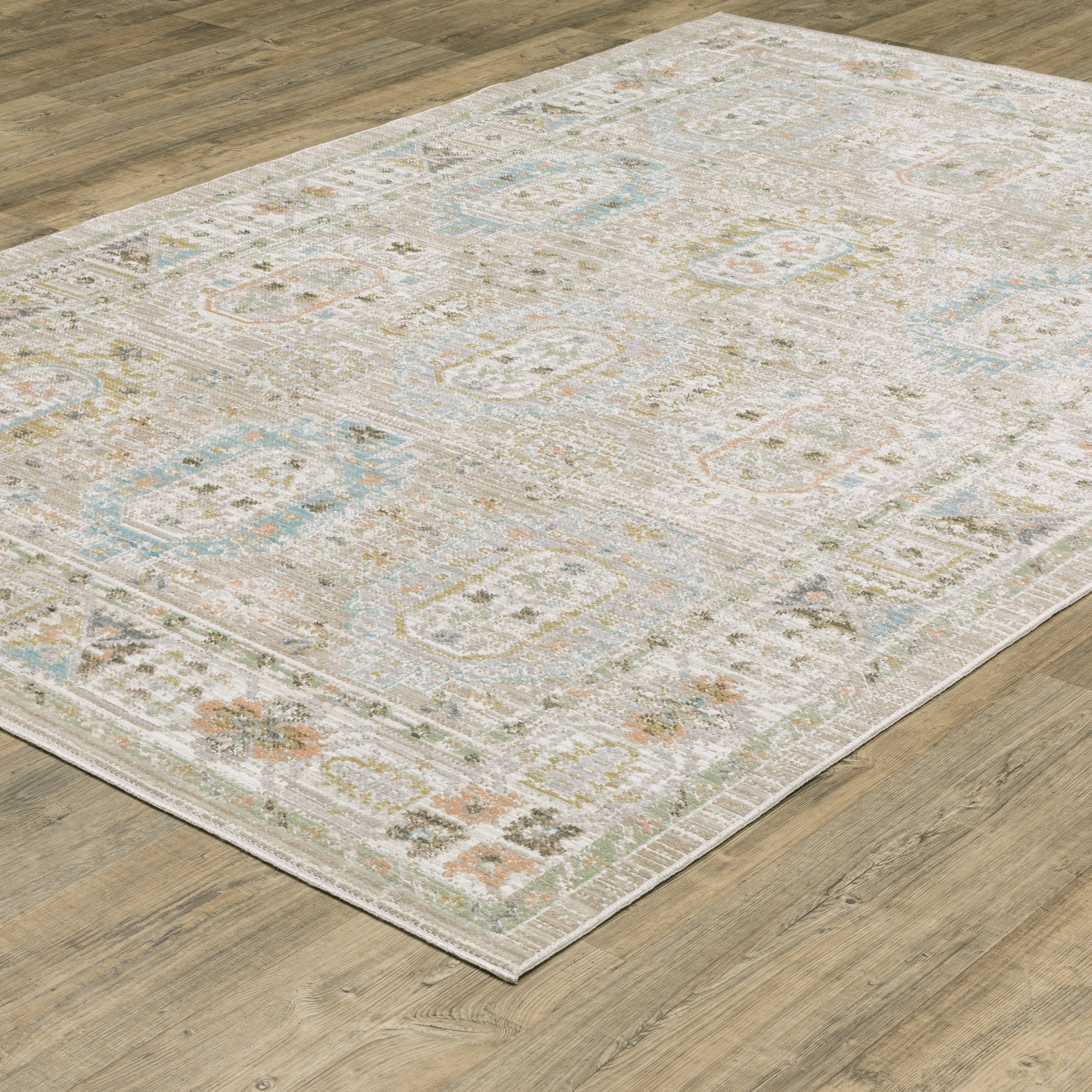 Oriental Weavers Cavett CAV04 soft transitional rug featuring decorative pattern in beige/ blue tones