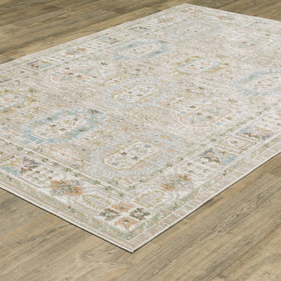 Oriental Weavers Cavett CAV04 soft transitional rug featuring decorative pattern in beige/ blue tones