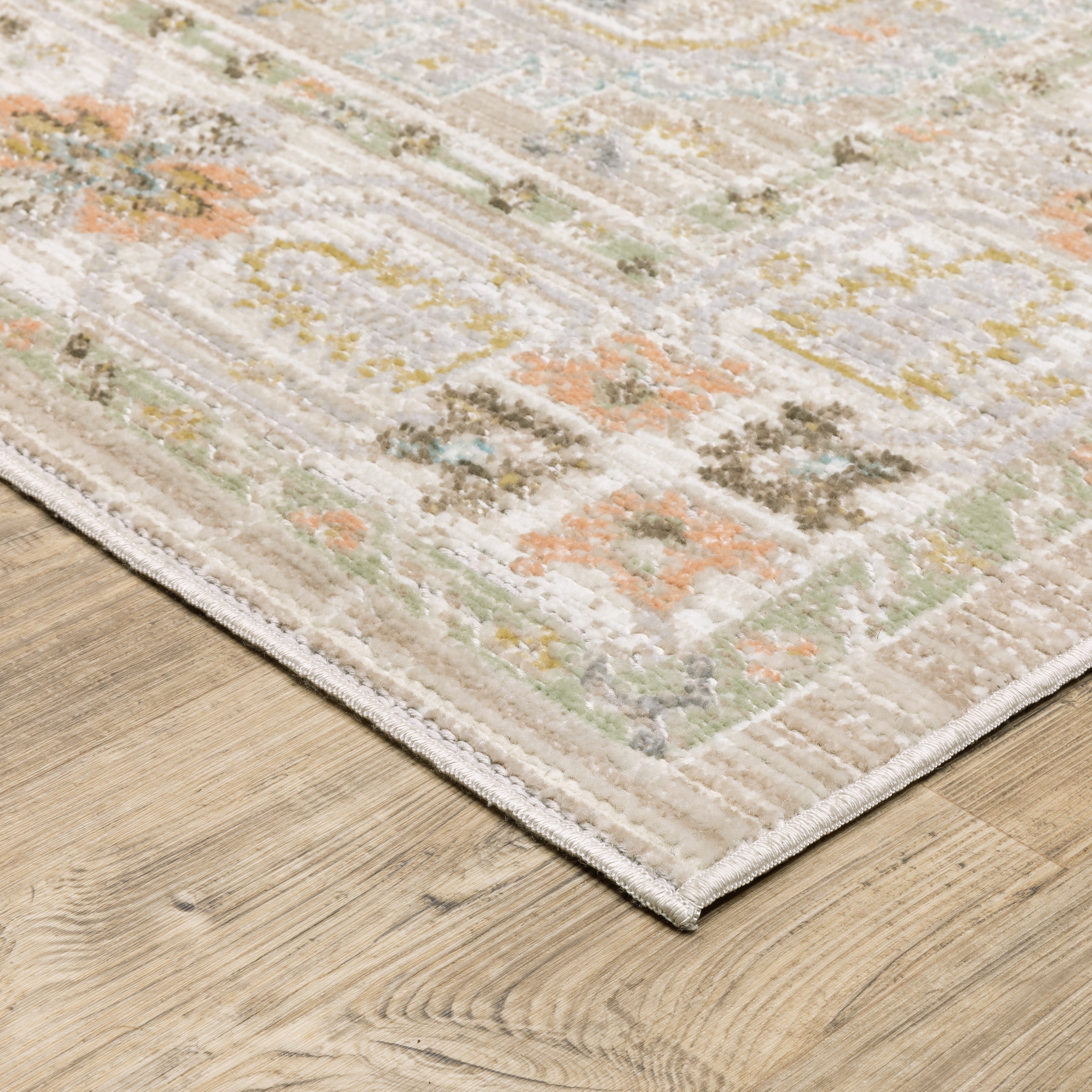 Oriental Weavers Cavett CAV04 soft transitional rug featuring decorative pattern in beige/ blue tones