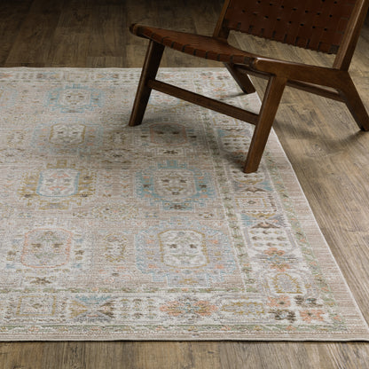 Oriental Weavers Cavett CAV04 soft transitional rug featuring decorative pattern in beige/ blue tones