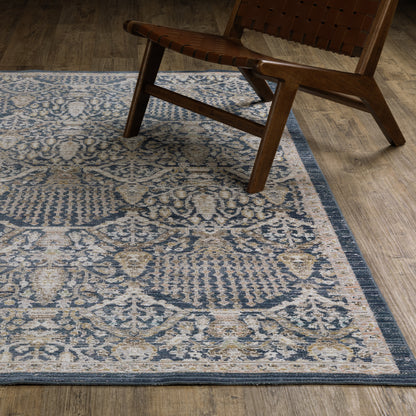 Oriental Weavers Cavett CAV06 soft transitional rug featuring decorative pattern in navy/ gold tones