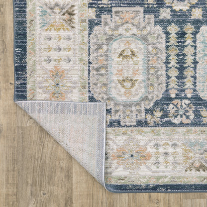 Oriental Weavers Cavett CAV07 soft transitional rug featuring decorative pattern in navy/ ivory tones