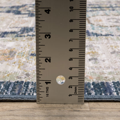 Oriental Weavers Cavett CAV07 soft transitional rug featuring decorative pattern in navy/ ivory tones