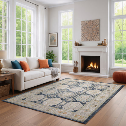 Oriental Weavers Cavett CAV07 soft transitional rug featuring decorative pattern in navy/ ivory tones