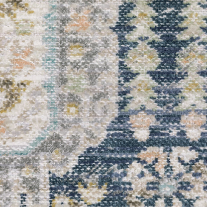Oriental Weavers Cavett CAV07 soft transitional rug featuring decorative pattern in navy/ ivory tones