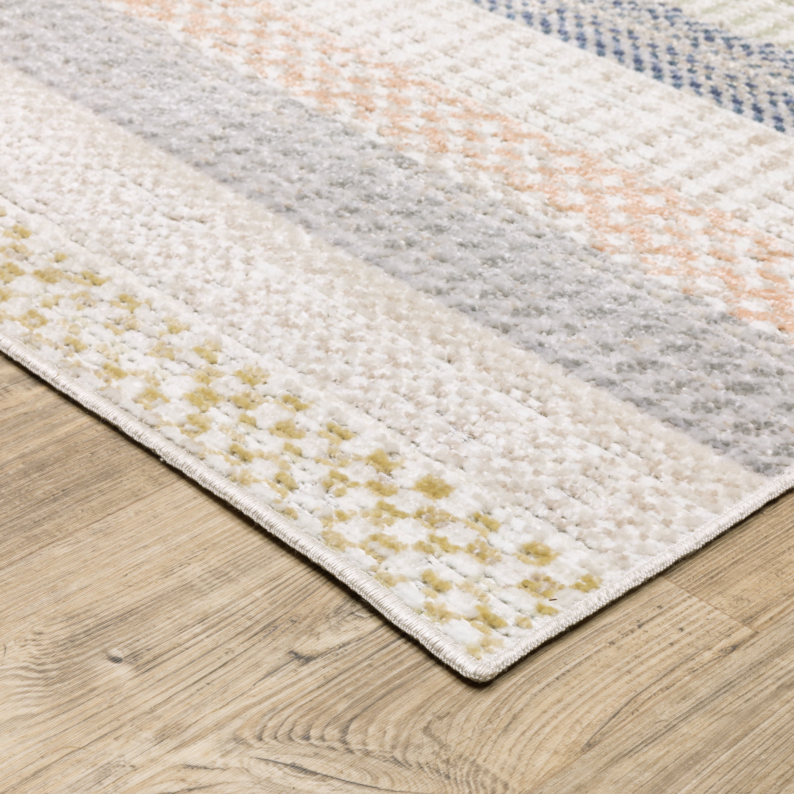 Oriental Weavers Cavett CAV08 soft transitional rug featuring decorative pattern in ivory/ multi tones