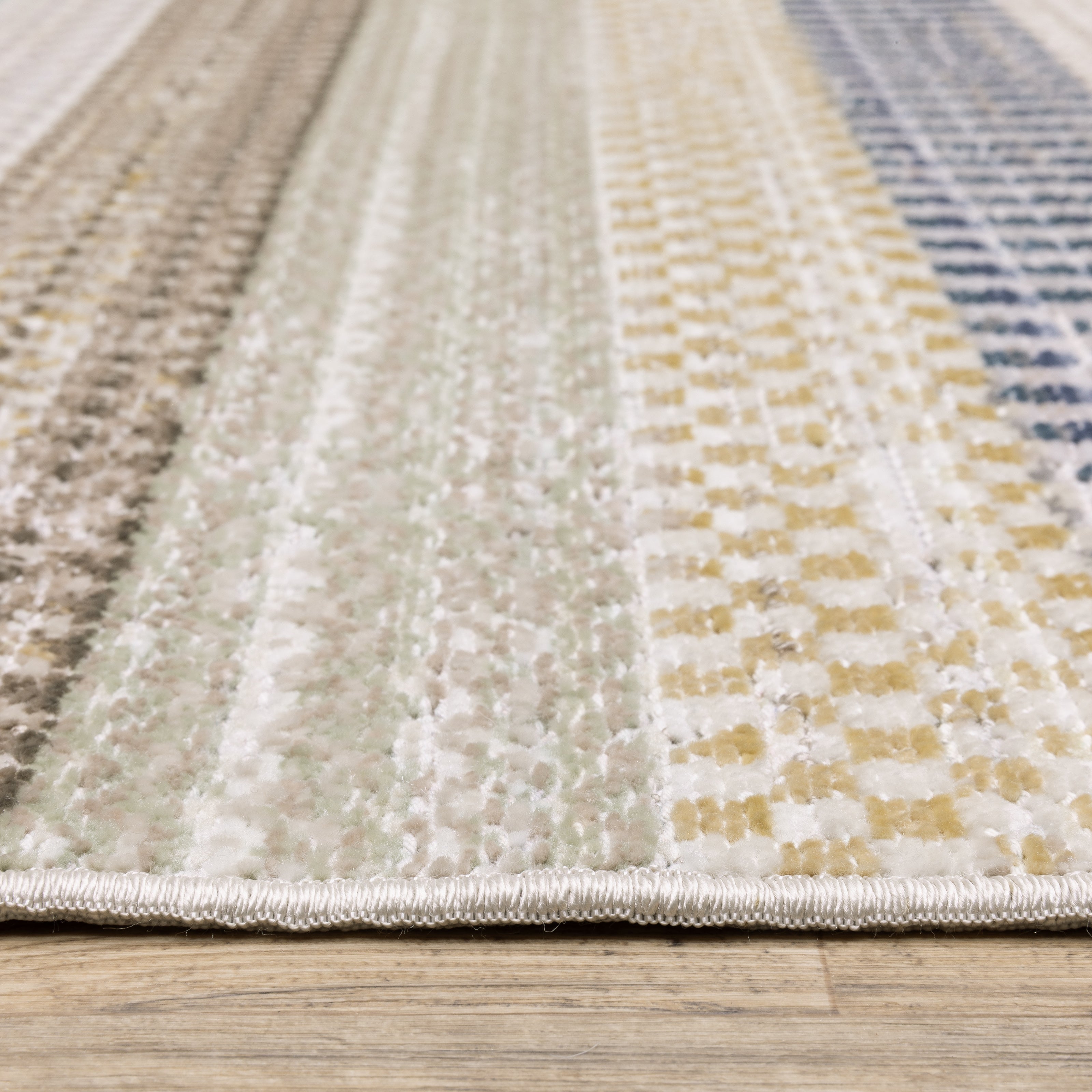 Oriental Weavers Cavett CAV08 soft transitional rug featuring decorative pattern in ivory/ multi tones