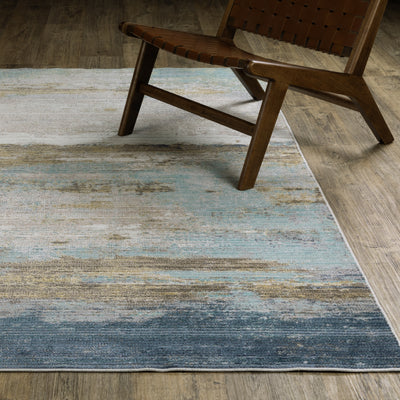 Oriental Weavers Cavett CAV09 soft transitional rug featuring decorative pattern in blue/ beige tones
