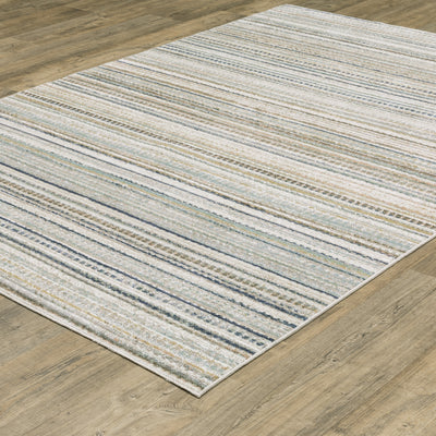Oriental Weavers Cavett CAV10 soft transitional rug featuring decorative pattern in beige/ multi tones