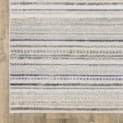 Oriental Weavers Cavett CAV10 soft transitional rug featuring decorative pattern in beige/ multi tones