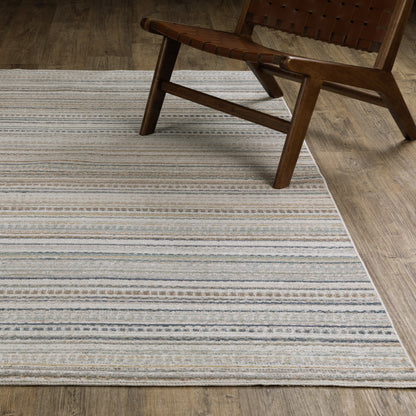 Oriental Weavers Cavett CAV10 soft transitional rug featuring decorative pattern in beige/ multi tones