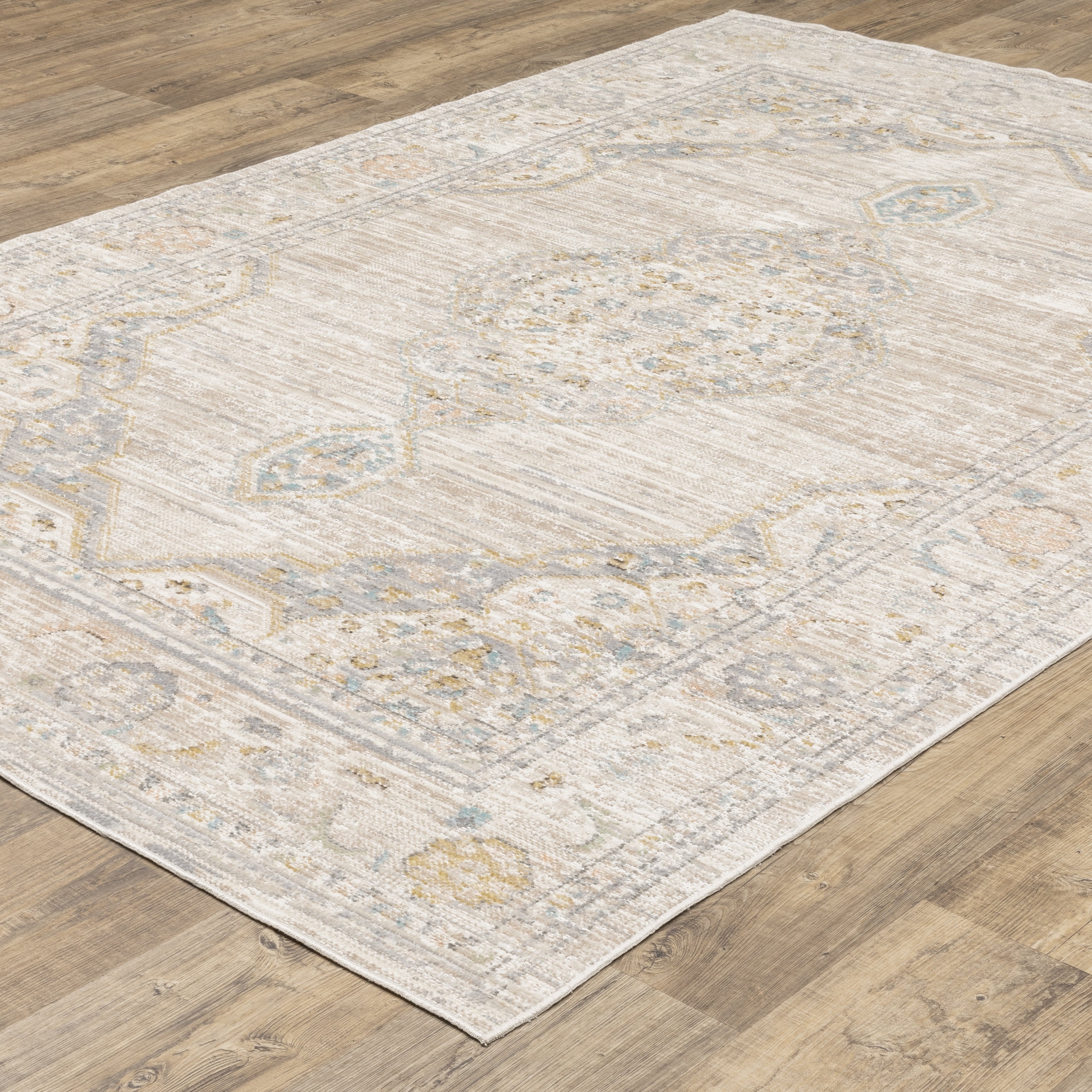 Oriental Weavers Cavett CAV11 soft transitional rug featuring decorative pattern in beige/ blue tones