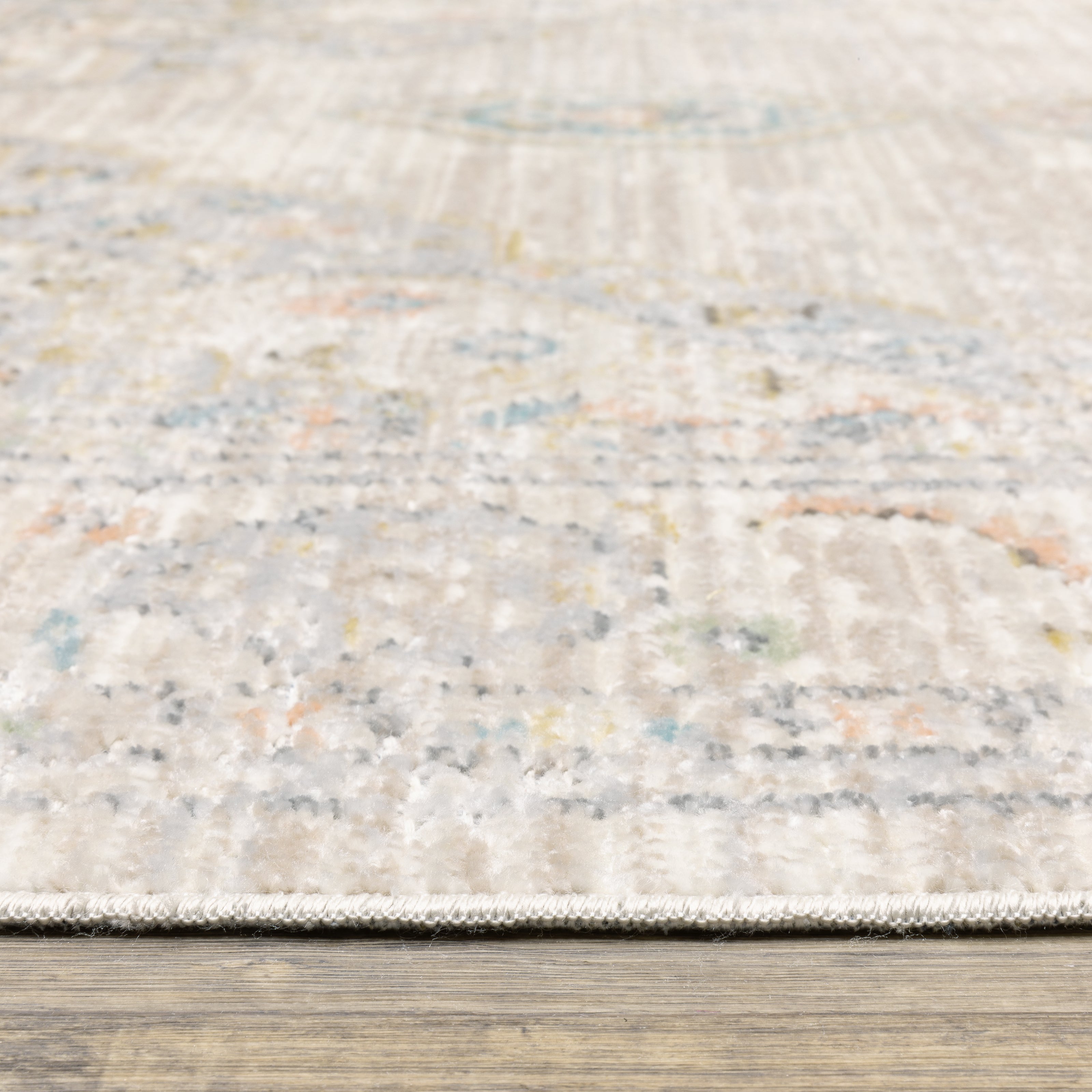 Oriental Weavers Cavett CAV11 soft transitional rug featuring decorative pattern in beige/ blue tones