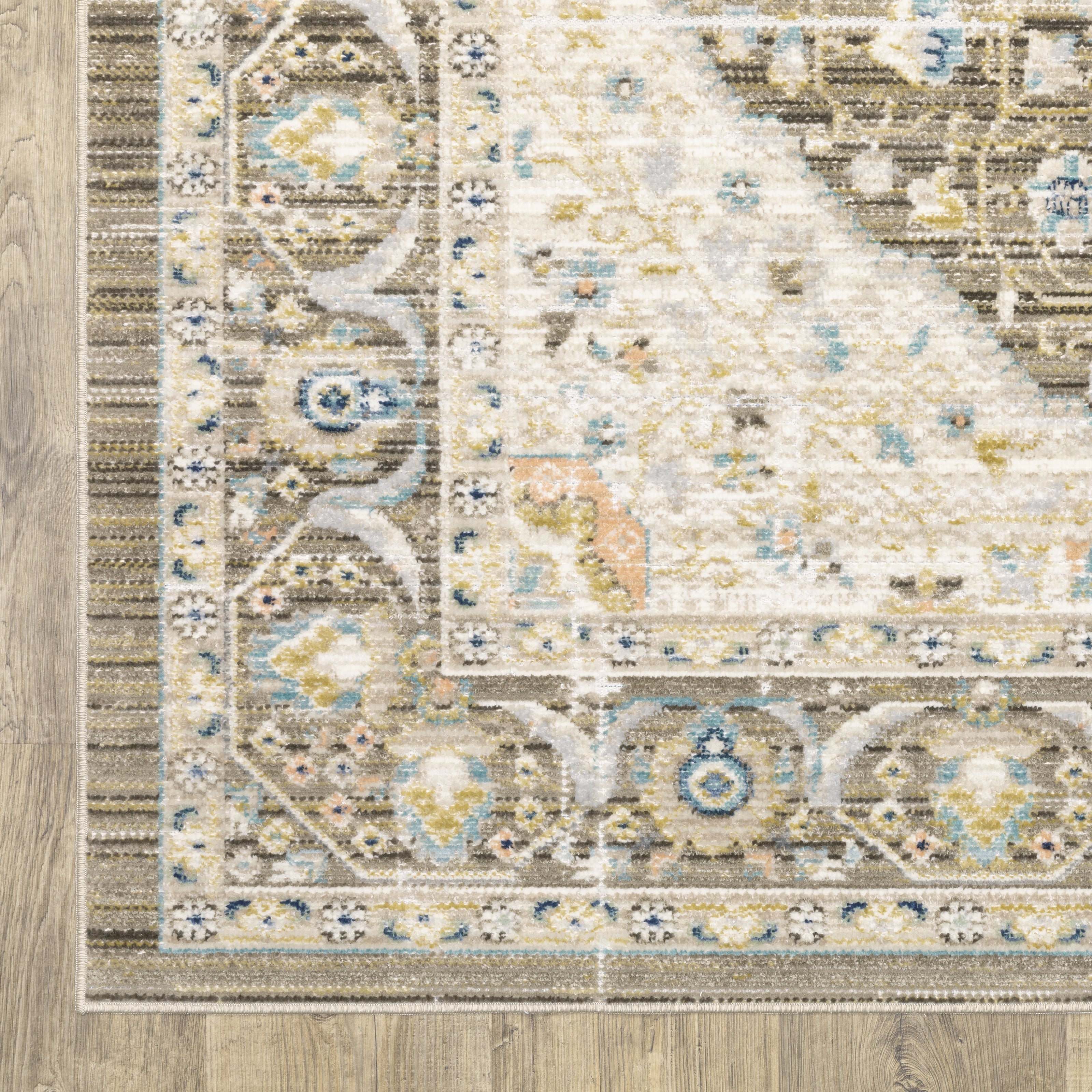 Oriental Weavers Cavett CAV12 soft transitional rug featuring decorative pattern in brown/ blue tones