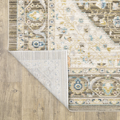 Oriental Weavers Cavett CAV12 soft transitional rug featuring decorative pattern in brown/ blue tones
